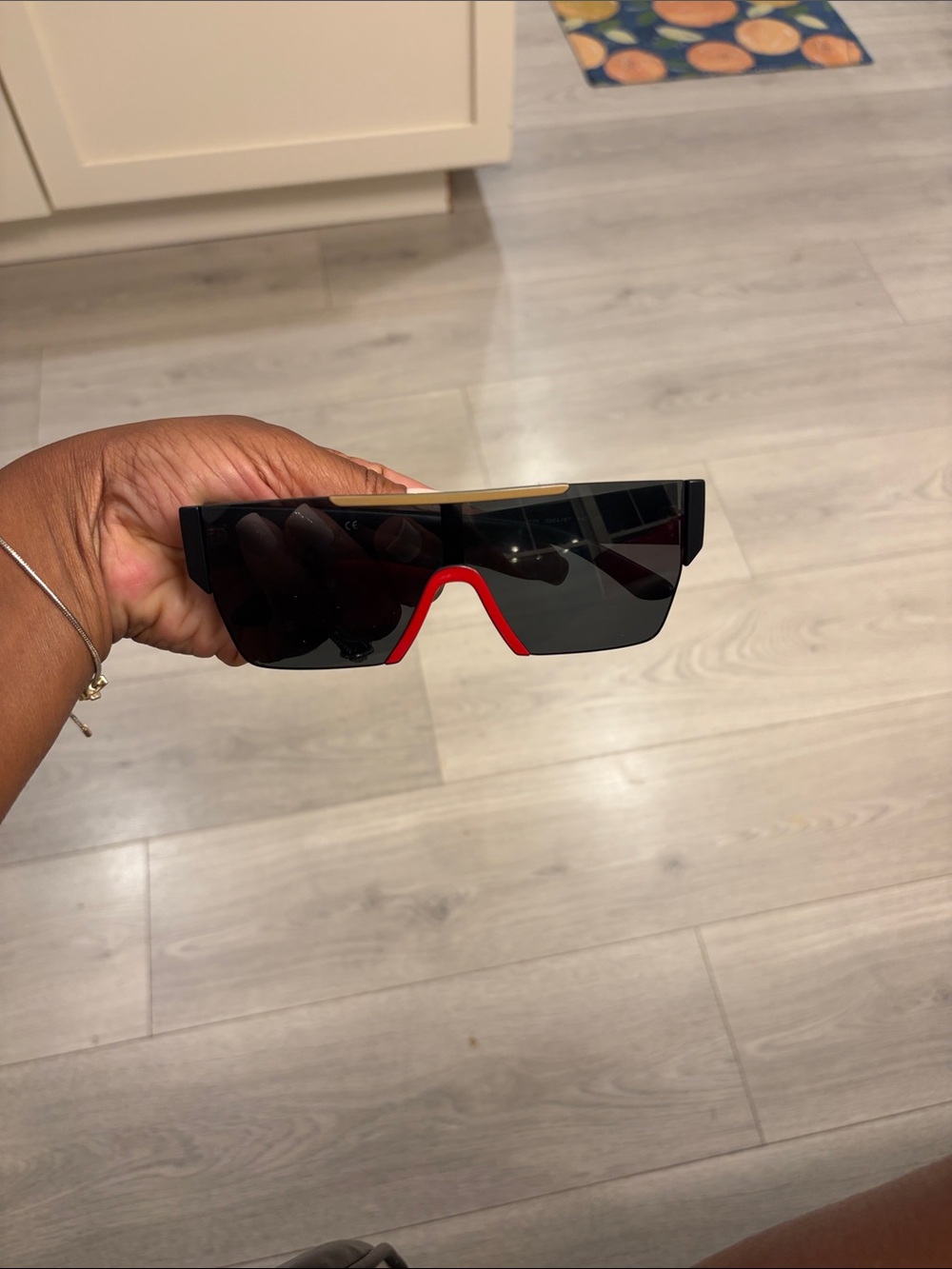 Burberry Black Shield Sunglasses with Red and Beige Accents